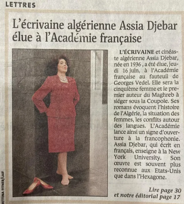 Newspaper article headlined “L’écrivaine algérienne Assia Djebar élue à l’Académie française”, with a photo of Djebar in a red suit, standing barefoot against a stone wall